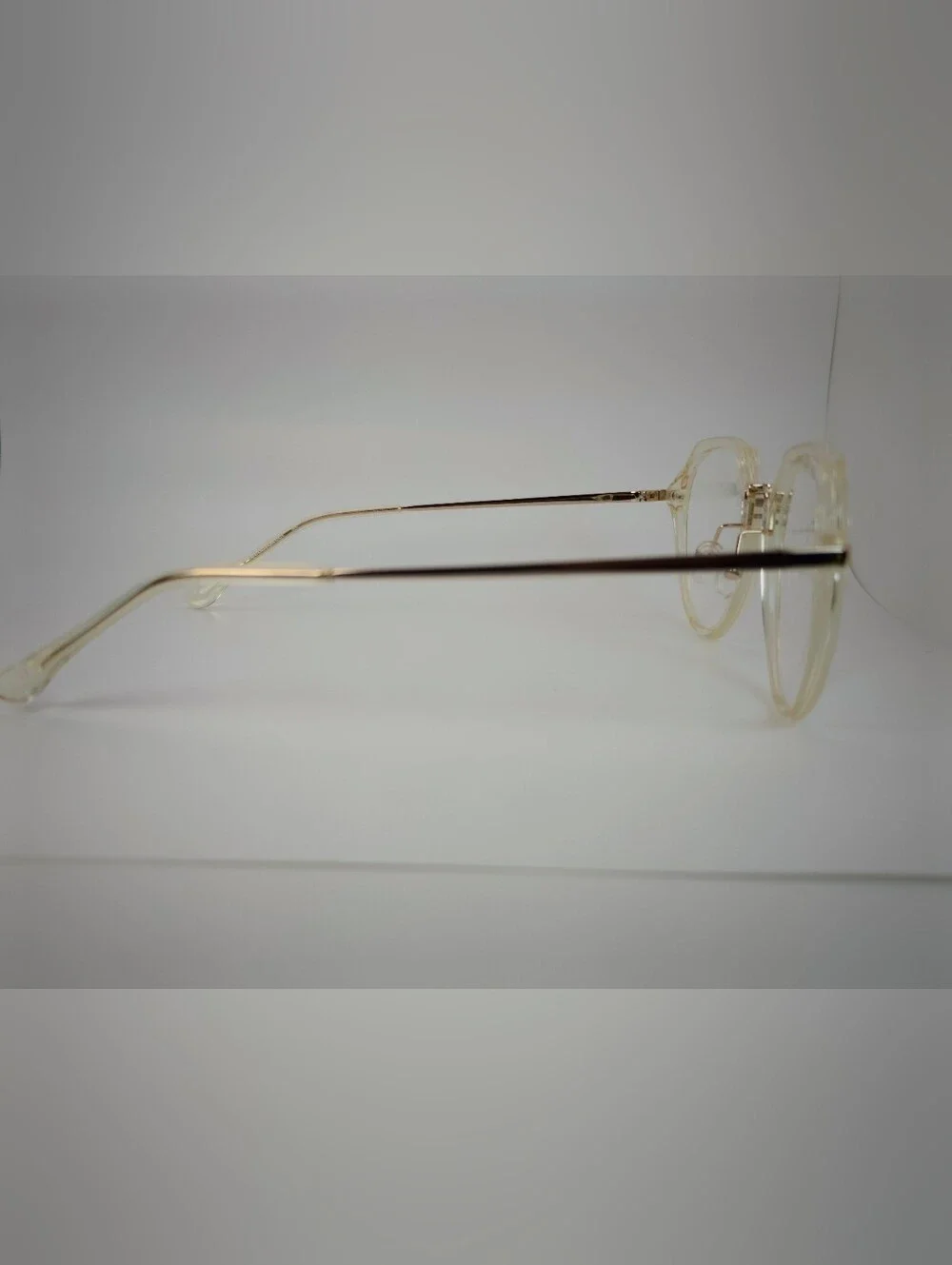 Tamara. Clear Round Frame Glasses with Gold Accents. Nose Pads. Metal Bridge